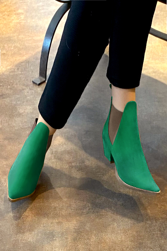 Emerald green and taupe brown women's ankle boots, with elastics. Pointed toe. Medium cone heels. Worn view - Florence KOOIJMAN
